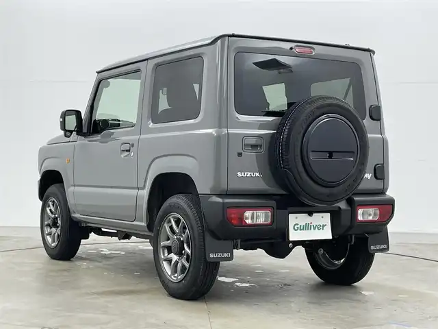 スズキ ジムニー XC 岡山県 2023(令5)年 2.1万km ミディアムグレー ８インチナビ　(SGC-812）/【CD/DVD/BT/フルセグ】/ターボ/シートヒーター　/ＬＥＤヘッドライト　/ＥＴＣ　/バックカメラ　/クルーズコントロール　/オートハイビーム　/ダウンヒルアシスト　/スマートキー/フォグランプ/純正アルミ/純正フロアマット/アイドリングストップ