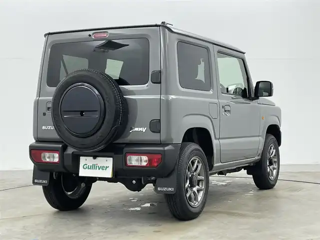 スズキ ジムニー XC 岡山県 2023(令5)年 2.1万km ミディアムグレー ８インチナビ　(SGC-812）/【CD/DVD/BT/フルセグ】/ターボ/シートヒーター　/ＬＥＤヘッドライト　/ＥＴＣ　/バックカメラ　/クルーズコントロール　/オートハイビーム　/ダウンヒルアシスト　/スマートキー/フォグランプ/純正アルミ/純正フロアマット/アイドリングストップ