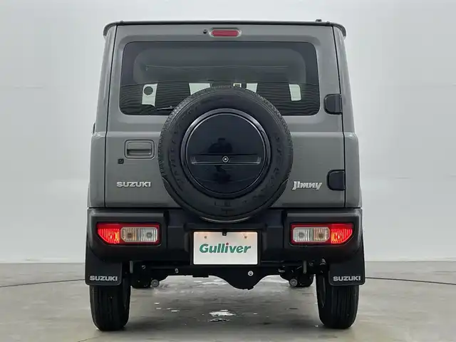 スズキ ジムニー XC 岡山県 2023(令5)年 2.1万km ミディアムグレー ８インチナビ　(SGC-812）/【CD/DVD/BT/フルセグ】/ターボ/シートヒーター　/ＬＥＤヘッドライト　/ＥＴＣ　/バックカメラ　/クルーズコントロール　/オートハイビーム　/ダウンヒルアシスト　/スマートキー/フォグランプ/純正アルミ/純正フロアマット/アイドリングストップ