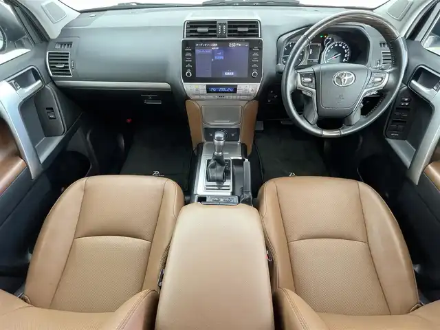 トヨタ ランドクルーザー プラド TX-L 70thアニバーサリーLTD 福井県 2022(令4)年 1.9万km ホワイトパールクリスタルシャイン 純正メーカーオプション９インチナビ/７人乗り仕様/寒冷地仕様　/全方位モニター　/プラドスーパーライブサウンド　　/サドルタン快適温熱レザーシート/純正１８インチアルミホイール　/純正スターター　/純正ビルトインＥＴＣ２．０/純正LEDヘッドライト/純正LEDフロントフォグ/フロントシールドデアイサー/ブラックルーフレール/JAOS製フロントスキッドバー/コンビハンドル/トヨタセーフティセンス/社外マフラー