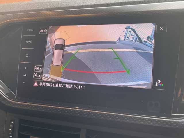 フォルクスワーゲン Ｔ－クロス TSI アクティブ 高知県 2022(令4)年 1.8万km 白 純正HDDナビ/【Bluetooth】/バックカメラ/クルーズコントロール(追従走行有り)/衝突被害軽減ブレーキ(プリクラッシュセーフティ：PCS)/パーキングアシスタント/ブラインドスポットモニター/横滑り防止/ルーフレール/コーナー、バックセンサー/ETC2.0/ドライブレコーダー前後/オートライト/純正LEDライト/スマートキー/プッシュスタート/MTモード付きAT/アイドリングストップ/純正アルミホイール 16インチ/ウインカーミラー/純正フロアマット