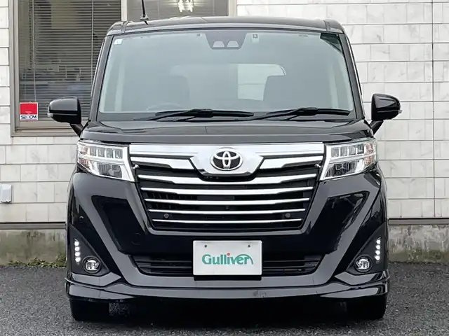 トヨタ ルーミー カスタムG－T 福岡県 2019(平31)年 2.7万km ブラックマイカメタリック ワンオーナー/純正9インチメモリナビ【NSZT-Y68T】/　(AM/FM/CD/DVD/Bluetooth/フルセグTV)/純正12.1インチフリップダウンモニター/全方位モニター/フロント・バックモニター/両側パワースライドドア/スマートアシストIII/・衝突警報機能/・衝突回避支援ブレーキ/・誤発進抑制制御機能/・車線逸脱警報/・先行車発進お知らせ機能/・オートハイビーム/横滑り防止機能/純正前方ドライブレコーダー【DRT-H68A】/クルーズコントロール/ビルトインETC/純正15インチアルミホイール/前席シートヒーター/後席ロールサンシェード/後席シートバックテーブル/純正フロアマット/スペアキー×1/保証書/取扱説明書/ナビ取扱説明書