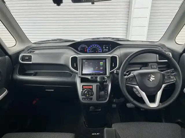 スズキ ソリオ HV MZ 高知県 2018(平30)年 5.3万km ピュアホワイトP 純正ナビ/　Bluetooth/フルセグ/　CD/DVD/AM/FM/全方位カメラ/ドライブレコーダー/ワンオーナー/クルーズコントロール/ETC/MTモード付AT/パドルシフト/プッシュスタート/スマートキー/両側パワースライドドア/HIDヘッドライト/純正15インチアルミホイール/純正フロアマット/シートヒーター/アイドリングストップ/オートライト/記録簿/保証書/取扱説明書/盗難防止装置