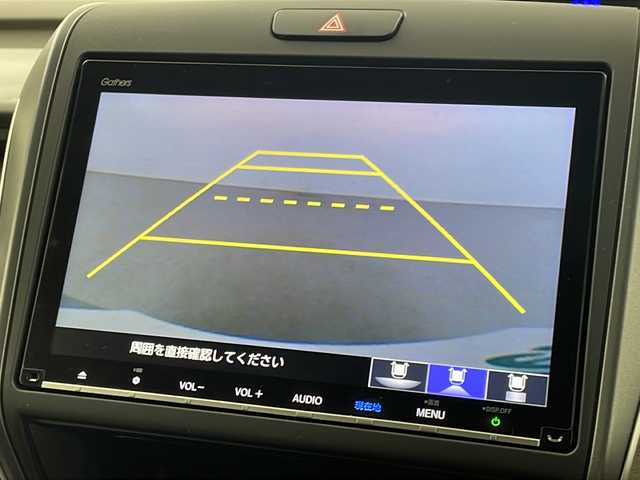 ホンダ フリード ハイブリット G 岐阜県 2023(令5)年 5.2万km フィヨルドミストパール 純正９インチナビ　/フルセグＴＶ　/純正１０インチフリップダウンモニター　/バックカメラ　/両側パワースライドドア　/ビルトインＥＴＣ　/Ｂｌｕｅｔｏｏｔｈ　/電格ミラー　/スマートキー　/シートヒーター/純正フロアマット/純正アルミホイール/LEDヘッドライト/コーナーセンサー/エンジンスタートボタン