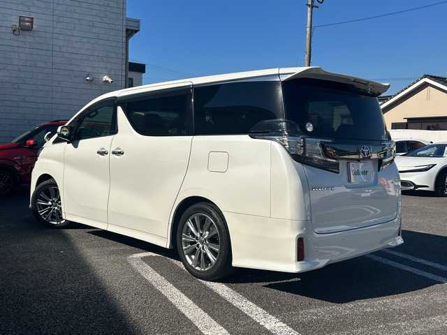 トヨタ ヴェルファイア Z Aエディション ゴールデンアイズ 大分県 2017(平29)年 8.9万km ホワイトパールクリスタルシャイン 〇ワンオーナー/〇純正メモリーナビ（NSZN-Z66T）/　CD/DVD/BT/フルセグ/ラジオ/〇バックカメラ/〇純正フリップダウンモニター/〇社外ドラブレコーダー/〇クルーズコントロール/〇両側パワースライドドア/〇ウッドコンビハンドル/〇ステアリングスイッチ/〇ETC/〇スマートキー/〇エンジンプッシュスタート/〇黒木目調パネル/〇フロアマット/〇ドアバイザー/〇nanoeエアコン/〇AC100V電源/〇パワーバックドア/〇保証書/〇取扱説明書/〇スペアキー