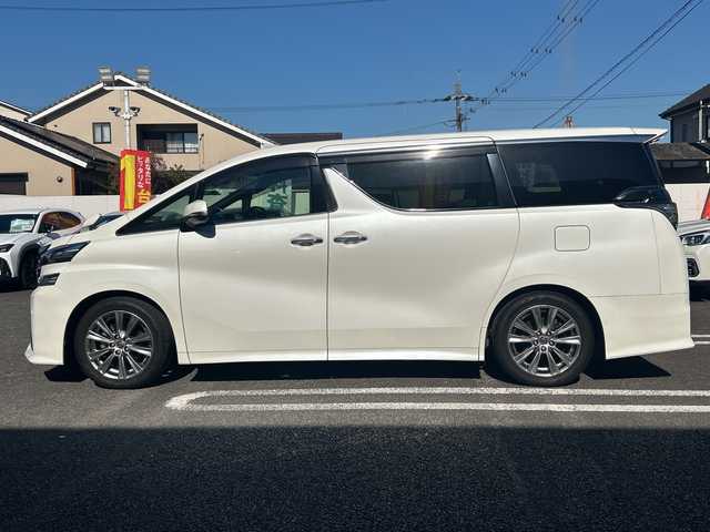 トヨタ ヴェルファイア Z Aエディション ゴールデンアイズ 大分県 2017(平29)年 8.9万km ホワイトパールクリスタルシャイン 〇ワンオーナー/〇純正メモリーナビ（NSZN-Z66T）/　CD/DVD/BT/フルセグ/ラジオ/〇バックカメラ/〇純正フリップダウンモニター/〇社外ドラブレコーダー/〇クルーズコントロール/〇両側パワースライドドア/〇ウッドコンビハンドル/〇ステアリングスイッチ/〇ETC/〇スマートキー/〇エンジンプッシュスタート/〇黒木目調パネル/〇フロアマット/〇ドアバイザー/〇nanoeエアコン/〇AC100V電源/〇パワーバックドア/〇保証書/〇取扱説明書/〇スペアキー