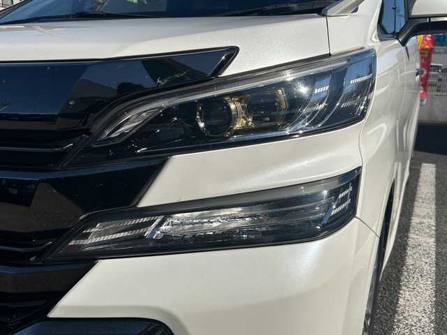 トヨタ ヴェルファイア Z Aエディション ゴールデンアイズ 大分県 2017(平29)年 8.9万km ホワイトパールクリスタルシャイン 〇ワンオーナー/〇純正メモリーナビ（NSZN-Z66T）/　CD/DVD/BT/フルセグ/ラジオ/〇バックカメラ/〇純正フリップダウンモニター/〇社外ドラブレコーダー/〇クルーズコントロール/〇両側パワースライドドア/〇ウッドコンビハンドル/〇ステアリングスイッチ/〇ETC/〇スマートキー/〇エンジンプッシュスタート/〇黒木目調パネル/〇フロアマット/〇ドアバイザー/〇nanoeエアコン/〇AC100V電源/〇パワーバックドア/〇保証書/〇取扱説明書/〇スペアキー