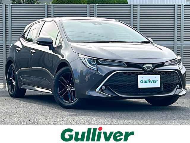 トヨタ カローラ スポーツ G スタイルパッケージ 千葉県 2021(令3)年 1.1万km グレーメタリック 6速MT/純正ディスプレイオーディオ/バックカメラ/Bluetooth/USB接続/Miracast/ビルトインETC/LEDヘッドライト/オートマチックハイビーム/フロントフォグランプ/電動格納ウィンカーミラー/前席シートヒーター/ステアリングヒーター/トヨタセーフティーセンス/プリクラッシュセーフティ/前後コーナーセンサー/レーンキープアシスト/ロードサインアシスト/レーダークルーズコントロール/電動パーキングブレーキ/ブレーキホールド/プッシュスタート/スマートキー（スペアキー1本）/純正フロアマット/純正16インチアルミホイール