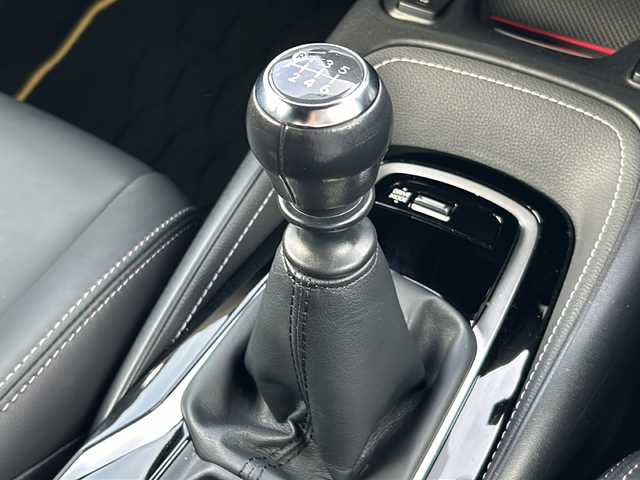 トヨタ カローラ スポーツ G スタイルパッケージ 千葉県 2021(令3)年 1.1万km グレーメタリック 6速MT/純正ディスプレイオーディオ/バックカメラ/Bluetooth/USB接続/Miracast/ビルトインETC/LEDヘッドライト/オートマチックハイビーム/フロントフォグランプ/電動格納ウィンカーミラー/前席シートヒーター/ステアリングヒーター/トヨタセーフティーセンス/プリクラッシュセーフティ/前後コーナーセンサー/レーンキープアシスト/ロードサインアシスト/レーダークルーズコントロール/電動パーキングブレーキ/ブレーキホールド/プッシュスタート/スマートキー（スペアキー1本）/純正フロアマット/純正16インチアルミホイール