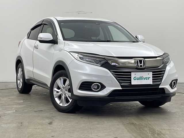 ホンダ ヴェゼル X ホンダセンシング 秋田県 2018(平30)年 14.5万km プラチナホワイトパール 社外ナビ　ＣＮ－ＲＡ０４Ｄ/・フルセグテレビ/・ＢＴ/・ＣＤ、ＤＶＤ、ＳＤ/・ラジオ/・ＵＳＢ/・ＨＤＭＩ/フロントワイパーデアイサー/前席シートヒーター/電動格納ミラー/ステアリングスイッチ/横滑り防止装置/レーンキープアシスト/オートライト/サマータイヤ　ゴムのみ積載　215/60R16