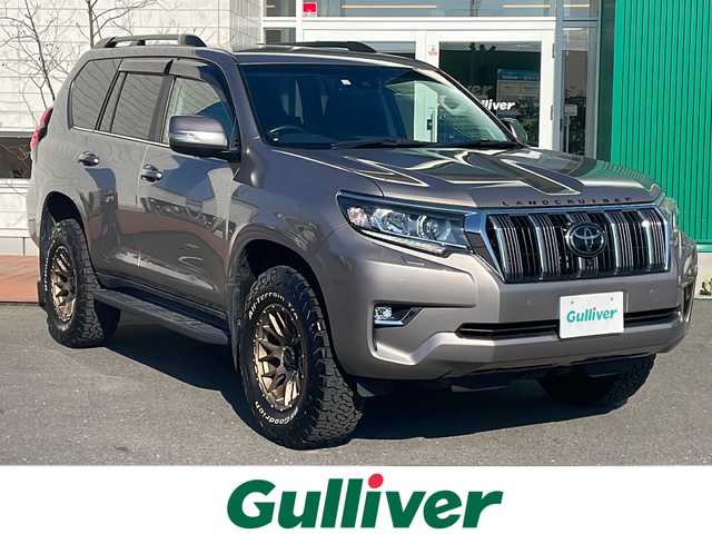 トヨタ ランドクルーザー プラド TX Lパッケージ 青森県 2023(令5)年 2.8万km アバンギャルドブロンズメタリック ワンオーナー/寒冷地仕様/純正メーカーナビ・フルセグTV/パノラミックビューモニター/黒革シート/前席エアシート・ヒーター/セーフティセンス/プリクラッシュセーフティ/レーダークルーズコントロール/レーンディパーチャーアラート/オートマチックハイビーム/OPブラインドスポットモニター/OPクリアランスソナー/ワイパーデアイサー/スマートキー一体式エンジンスターター/ビルトインETC2.0/LEDヘッドライト/LEDフォグランプ/リアフォグランプ/ブラックルーフレール/社外17インチアルミ夏タイヤ/純正17インチアルミスタッドレス車内/バッテリー2個