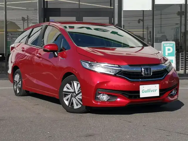 ホンダ シャトル ハイブリッド X ホンダセンシング 茨城県 2019(平31)年 6.8万km プレミアムクリスタルレッドM 社外ナビ/【DISC・SD・AM・FM・TV・BT・iPod・USB・AUX】/シートヒーター/ETC/Bカメラ/レーダークルコン/パドルシフト/チップアップシート/オートライト/Fフォグ/LEDライト/純正ホイールカバー/電格ミラー/ウインカーミラー