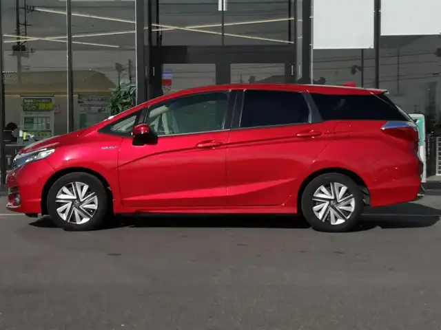 ホンダ シャトル ハイブリッド X ホンダセンシング 茨城県 2019(平31)年 6.8万km プレミアムクリスタルレッドM 社外ナビ/【DISC・SD・AM・FM・TV・BT・iPod・USB・AUX】/シートヒーター/ETC/Bカメラ/レーダークルコン/パドルシフト/チップアップシート/オートライト/Fフォグ/LEDライト/純正ホイールカバー/電格ミラー/ウインカーミラー