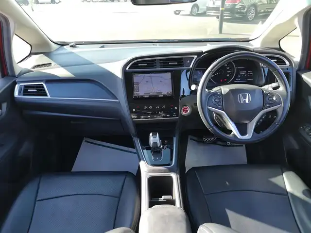 ホンダ シャトル ハイブリッド X ホンダセンシング 茨城県 2019(平31)年 6.8万km プレミアムクリスタルレッドM 社外ナビ/【DISC・SD・AM・FM・TV・BT・iPod・USB・AUX】/シートヒーター/ETC/Bカメラ/レーダークルコン/パドルシフト/チップアップシート/オートライト/Fフォグ/LEDライト/純正ホイールカバー/電格ミラー/ウインカーミラー