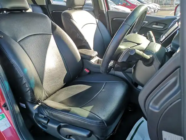 ホンダ シャトル ハイブリッド X ホンダセンシング 茨城県 2019(平31)年 6.8万km プレミアムクリスタルレッドM 社外ナビ/【DISC・SD・AM・FM・TV・BT・iPod・USB・AUX】/シートヒーター/ETC/Bカメラ/レーダークルコン/パドルシフト/チップアップシート/オートライト/Fフォグ/LEDライト/純正ホイールカバー/電格ミラー/ウインカーミラー