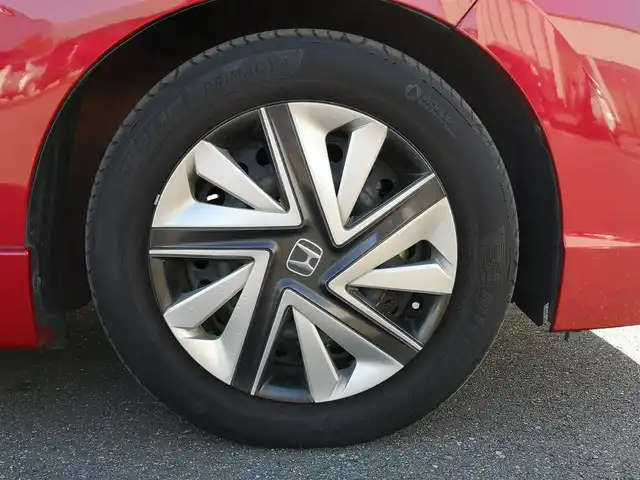 ホンダ シャトル ハイブリッド X ホンダセンシング 茨城県 2019(平31)年 6.8万km プレミアムクリスタルレッドM 社外ナビ/【DISC・SD・AM・FM・TV・BT・iPod・USB・AUX】/シートヒーター/ETC/Bカメラ/レーダークルコン/パドルシフト/チップアップシート/オートライト/Fフォグ/LEDライト/純正ホイールカバー/電格ミラー/ウインカーミラー