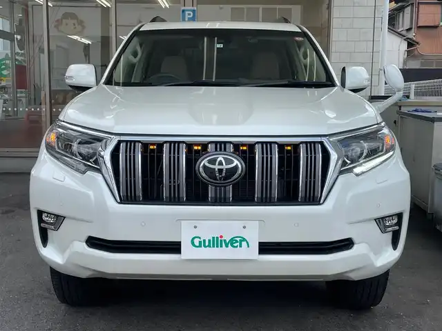 トヨタ ランドクルーザー プラド TX 愛知県 2022(令4)年 2.5万km ホワイトパールクリスタルシャイン /当店買取/禁煙/7人乗り/サンルーフ//純正SDナビNSZT-Y68T//フルセグTV/CD/SD/DVD/USB/Bluetooth//バックカメラ//LEDヘッド/AHB/Aライト//PCS/LDA/RSA/Pソナー//レーダークルーズコントロール//革巻きステアリング///ETC//保証書/取説/ナビ取説//スペアキー
