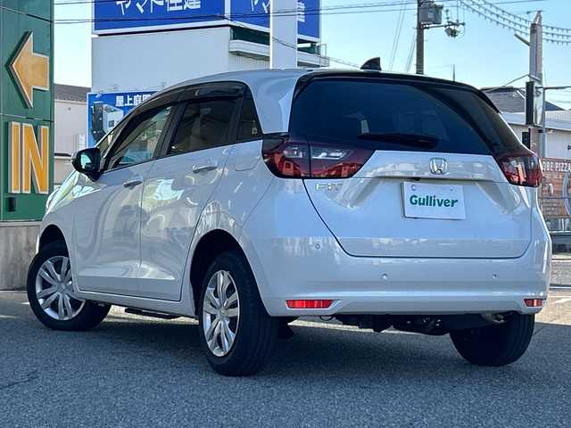 ホンダ フィット ホーム 兵庫県 2022(令4)年 1.8万km プラチナホワイトパール ワンオーナー/純正ディーラーオプションナビ(VXU-225FTi)/(AM/FM/CD/DVD/Blue Tooth)/純正前方録画ドラレコ(DRH-204VD)/バックカメラ/ETC2.0/レーダークルーズコントロール/電動パーキングブレーキ/オートブレーキホールド/SOSコール/プリクラッシュ/コーナーセンサー/横滑り防止装置/車線逸脱警報/取扱説明書/保証書