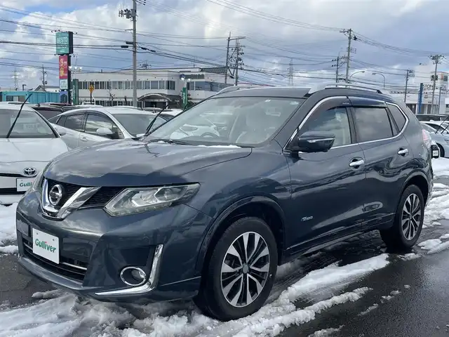 日産 エクストレイル ハイブリッド モード・プレミア 山形県 2016(平28)年 6.6万km スチールブルー 4WD/エマージェンシーブレーキ/純正SDナビ/　　【CD BT フルセグ USB AUX】/アラウンドビューモニター/電動リアゲート/クルーズコントロール/LEDオートヘッドライト/シートヒーター/純正18インチアルミホイール/アイドリングストップ/コーナーセンサー/ドライブレコーダー/ステアリングスイッチ/電動格納ウィンカーミラー/フォグランプ/インテリジェントキー×2/ETC