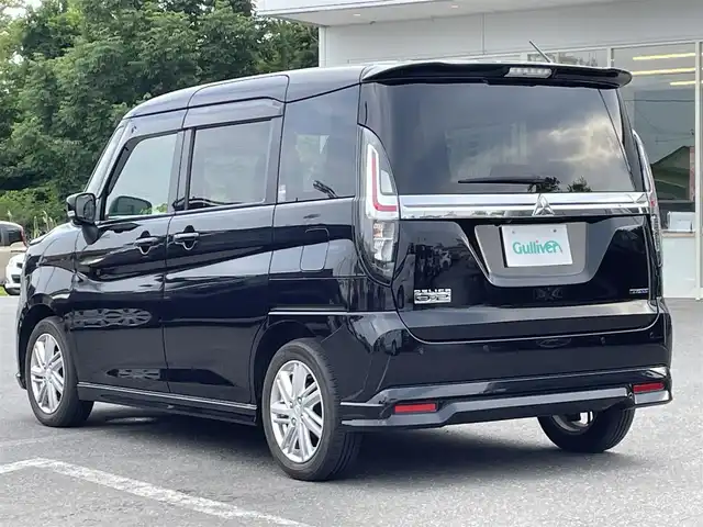 三菱 デリカＤ：２ ハイブリッドMZ 青森県 2023(令5)年 2万km スーパーブラックP 4WD/社外メモリーナビ(MDV-D709BT)/Bluetooth/CD/DVD/USB/バックカメラ/全方位カメラ/ドライブレコーダー/ヘッドアップディスプレイ/ETC/両側パワースライドドア/革シートカバー/ＬＥＤヘッドライト