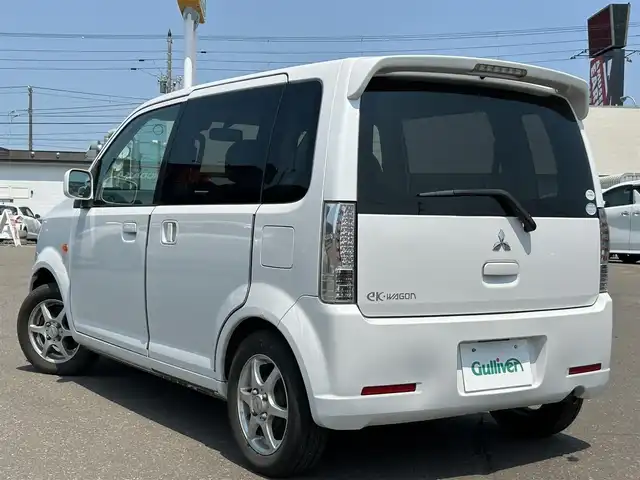 三菱 ｅＫワゴン GS 道東・釧路十勝 2009(平21)年 6.6万km シルキーホワイト 冬タイヤ積込み(社外)/パワーステアリング/片側スライドドア/パワーウィンドウ/純正オーディオ/メモリーナビ/ヒートシーター(運転席)/ワンセグTV/ワンオーナー/取扱説明書