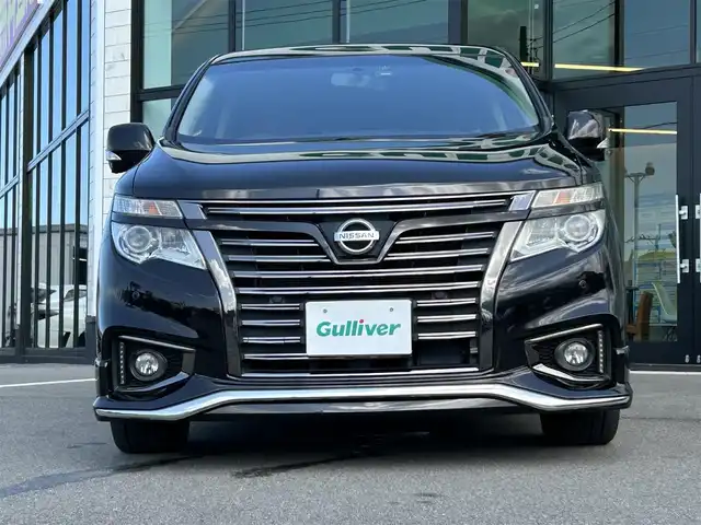 日産 エルグランド 350HWS ジェットブラック アーバンクロム 愛媛県 2018(平30)年 5.6万km ファントムブラック 純正8型ナビ/全周囲カメラ/両側電動スライドドア/フリップダウンモニター/ドライブレコーダー/アダプティブクルーズコントロール/クリアランスソナー/電動リアゲート/茶革温電動シート/シートメモリー機能/エンジンスターター/100V/100Wコンセント/リバース連動ミラー/電格ミラー/ステアリングリモコン/車線逸脱防止装置/衝突被害軽減装置/現状サマー(純正AＷ)(225/55/R18)/YOKOHAMA ADVANdB V552/禁煙車