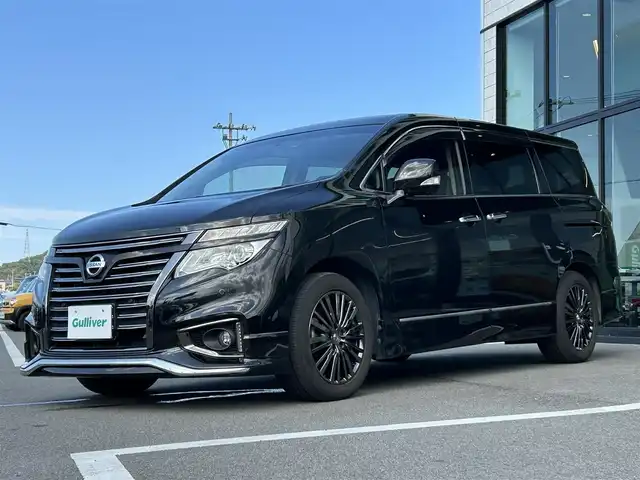 日産 エルグランド 350HWS ジェットブラック アーバンクロム 愛媛県 2018(平30)年 5.6万km ファントムブラック 純正8型ナビ/全周囲カメラ/両側電動スライドドア/フリップダウンモニター/ドライブレコーダー/アダプティブクルーズコントロール/クリアランスソナー/電動リアゲート/茶革温電動シート/シートメモリー機能/エンジンスターター/100V/100Wコンセント/リバース連動ミラー/電格ミラー/ステアリングリモコン/車線逸脱防止装置/衝突被害軽減装置/現状サマー(純正AＷ)(225/55/R18)/YOKOHAMA ADVANdB V552/禁煙車