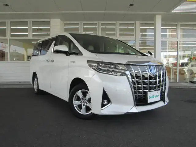 トヨタ アルファードハイブリット X 千葉県 2020(令2)年 5.3万km ホワイトパールクリスタルシャイン ワンオーナー/純正ディスプレイオーディオ(ナビ有)/バックカメラ/純正オーディオ【フルセグTV/DVD/CD/BT/USB】/純正12.1型後席フリップダウンモニター/ツインムーンルーフ/両側パワースライドドア/Toyota Safety Sense/LEDヘッドライト&LEDフォグランプ/レーダークルーズコントロール/レーンキープアシスト/クリアランスソナー/純正ウッドコンビステアリング/純正ベージュ革調シートカバー/社外ルームミラー型レーダー/スペアタイヤ/AC100V/ビルトインETC/スペアキー×2/取扱説明書/ナビ取扱説明書/新車時保証書
