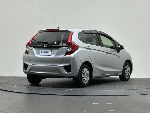 ホンダ フィット 13G Fパッケージ 愛媛県 2015(平27)年 8.4万km アラバスターシルバーメタリック 社外SDナビ/(CD/DVD/フルセグ/Bluetooth)/バックカメラ/ドライブレコーダー/アイドリングストップ/スマートキー/スペアキー/プッシュスタート/ウインカーミラー/ドアバイザー/電動格納ミラー