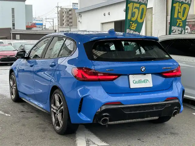 ＢＭＷ Ｍ１３５ｉ xDrive 福岡県 2019(令1)年 2.5万km ミサノブルー 禁煙車/純正ナビ/Bluetooth/クルーズコントロール追従有/前後ドライブレコーダー/前席パワーシート/コーナーセンサー（前後）/プッシュスタート/純正アルミホイール/純正フロアマット/パワーバックドア/パドルシフト/ビルトインETC/LEDヘッドライト/パワーステアリング/パワーウィンドウ/保証書/取扱説明書