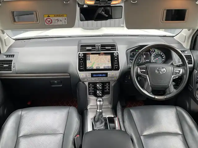 トヨタ ランドクルーザー プラド TZ－G 青森県 2020(令2)年 4.9万km ホワイトパールクリスタルシャイン /4WD/ディーゼル・ターボ/サンルーフ/黒革シート/　(D席メモリー付前席パワーシート//　前席シートヒーター/ベンチレーター)/3列目電動格納シート/OP寒冷地仕様車(Wバッテリー//　Fワイパーデアイサー/Rフォグ)/OP純正8型SDナビ/　(ブルーレイ/DVD/フルセグTV/USB/AUX/Bt)/スーパーライブサウンドシステム/全方位カメラ/純正エアサス/TRD(前後エアロ/マフラー/スカッフプレート)/Toyota Safety Sense /・プリクラッシュセーフティ/・レーンディパーチャーアラート/・オートマチックハイビーム/・レーダークルーズコントロール/OP/BSM/OP/ルーフレール/OP/ドアミラー足元照明/OP/トヨタマーク/カーテシランプ/OP/EGスターター/純正ドアバイザー/社外フロアマット(純正積込)/LEDオートライト/オートリベライザー//　オートマチックハイビーム/LEDフォグランプ/ウットコンビステア/オーディオ/ステアスイッチ/電動チルトステア/オートワイパー/純正カメラ一体型ドラレコ/デジタルインナーミラー/前後バンパーソナー/ウインカーミラー /純正サイドステップ/保・取