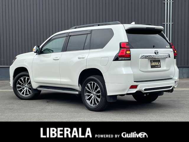 トヨタ ランドクルーザー プラド TZ－G 青森県 2020(令2)年 4.9万km ホワイトパールクリスタルシャイン /4WD/ディーゼル・ターボ/サンルーフ/黒革シート/　(D席メモリー付前席パワーシート//　前席シートヒーター/ベンチレーター)/3列目電動格納シート/OP寒冷地仕様車(Wバッテリー//　Fワイパーデアイサー/Rフォグ)/OP純正8型SDナビ/　(ブルーレイ/DVD/フルセグTV/USB/AUX/Bt)/スーパーライブサウンドシステム/全方位カメラ/純正エアサス/TRD(前後エアロ/マフラー/スカッフプレート)/Toyota Safety Sense /・プリクラッシュセーフティ/・レーンディパーチャーアラート/・オートマチックハイビーム/・レーダークルーズコントロール/OP/BSM/OP/ルーフレール/OP/ドアミラー足元照明/OP/トヨタマーク/カーテシランプ/OP/EGスターター/純正ドアバイザー/社外フロアマット(純正積込)/LEDオートライト/オートリベライザー//　オートマチックハイビーム/LEDフォグランプ/ウットコンビステア/オーディオ/ステアスイッチ/電動チルトステア/オートワイパー/純正カメラ一体型ドラレコ/デジタルインナーミラー/前後バンパーソナー/ウインカーミラー /純正サイドステップ/保・取