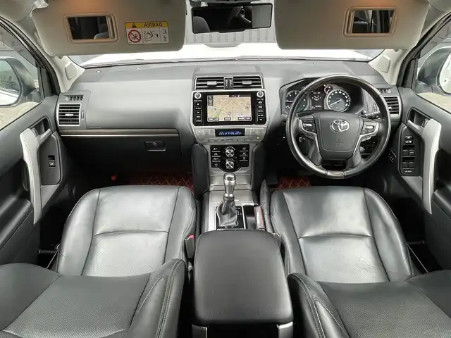 トヨタ ランドクルーザー プラド TZ－G 青森県 2020(令2)年 4.9万km ホワイトパールクリスタルシャイン /4WD/ディーゼル・ターボ/サンルーフ/黒革シート/　(D席メモリー付前席パワーシート//　前席シートヒーター/ベンチレーター)/3列目電動格納シート/OP寒冷地仕様車(Wバッテリー//　Fワイパーデアイサー/Rフォグ)/OP純正8型SDナビ/　(ブルーレイ/DVD/フルセグTV/USB/AUX/Bt)/スーパーライブサウンドシステム/全方位カメラ/純正エアサス/TRD(前後エアロ/マフラー/スカッフプレート)/Toyota Safety Sense /・プリクラッシュセーフティ/・レーンディパーチャーアラート/・オートマチックハイビーム/・レーダークルーズコントロール/OP/BSM/OP/ルーフレール/OP/ドアミラー足元照明/OP/トヨタマーク/カーテシランプ/OP/EGスターター/純正ドアバイザー/社外フロアマット(純正積込)/LEDオートライト/オートリベライザー//　オートマチックハイビーム/LEDフォグランプ/ウットコンビステア/オーディオ/ステアスイッチ/電動チルトステア/オートワイパー/純正カメラ一体型ドラレコ/デジタルインナーミラー/前後バンパーソナー/ウインカーミラー /純正サイドステップ/保・取
