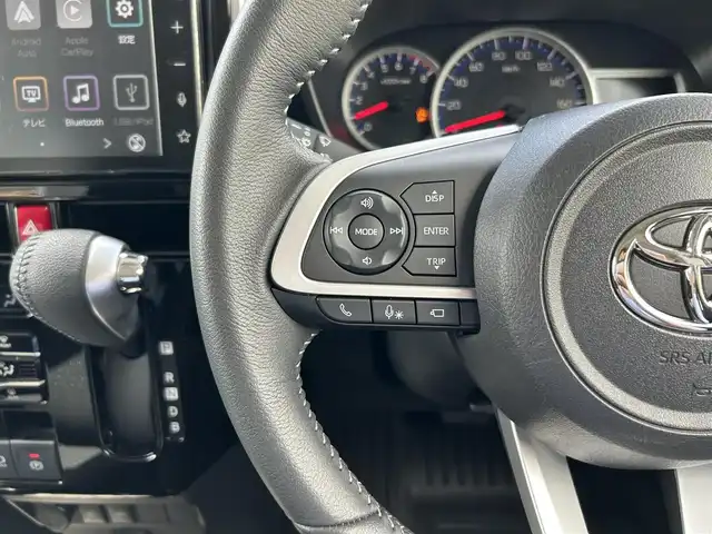 トヨタ ルーミー カスタムG－T 愛媛県 2022(令4)年 1.6万km ブラックマイカメタリック/パールホワイト2トーン メーカーオプションカラー［X99］/ブラックマイカメタリック〈X07〉×パールホワイトIII〈W24〉/純正9型ディスプレイオーディオ/フルセグTV・Bluetooth/パノラミックビューモニター・バックカメラ/両側パワースライドドア/コンフォートパッケージ/・ナノイーX/・シートヒーター（D+N席）/・シートバックテーブル/ビルドインETC/スマートアシスト/・衝突警報機能/衝突回避支援ブレーキ機能/・先行車発進お知らせ機能/・標識認識機能/・車線逸脱警報機能/・路側逸脱警報/・ふらつき警報/・アダプティブクルーズコントロール/・サイドビューランプ/・オートハイビーム/・ADB（アダプティブドライビングビーム）/・ブレーキ制御付誤発進抑制機能（前方・後方）/・コーナーセンサー/・電動パーキングブレーキ/・ブレーキホールド/・緊急ブレーキシグナル/スマートキー・スペアキー/取扱説明書