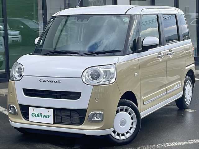 ダイハツ ムーヴ キャンバス ストライプス G 道東・釧路十勝 2024(令6)年 1万km シャイニングホワイトパール/サンドベージュメタリック ・４WD/・社外7インチメモリナビ/（BT・FM・AM・USB）/・バックカメラ/・ETC/・両側パワースライドドア/・スマートアシスト/・衝突警報/・衝突回避支援ブレーキ/・ペダル踏み間違い時加速抑制/・前席シートヒーター/・前席ほっとカップホルダー/・アイドリングストップ/・横滑り防止/・前後コーナーセンサー/・LEDヘッドライト/・LEDフォグランプ/・電動格納ミラー/・プッシュスタート/・スマートキー/・ダブルエアバッグ/・保証書