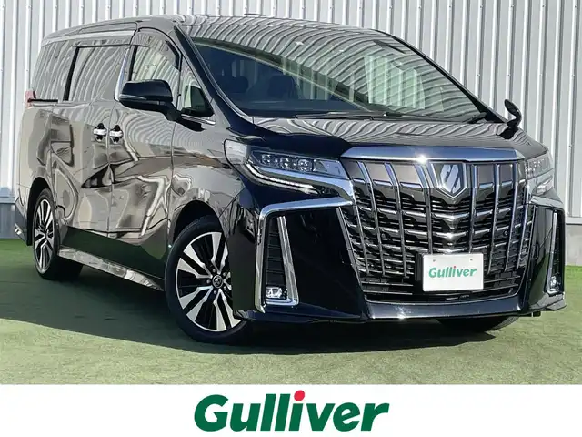 トヨタ アルファード S Cパッケージ 香川県 2019(平31)年 1.9万km ブラック 登録時走行距離；18306km/アルパインナビ11インチ/12．8型アルパイン後席モニター/ツインムーンルーフ/3眼LEDヘッドライト/バックカメラ/前後ドライブレコーダー/電動リアゲート/パワーシート/シートヒーター/ベンチレーション/両側パワースライドドア/トヨタセーフティーセンス/・プリクラッシュセーフティー/・クルーズコントロール/・レーンディパーチャーアラート/・オートマチックハイビーム/社外コーナーセンサー/オットマン/純正フロアマット/純正AW18インチ/スマートキー