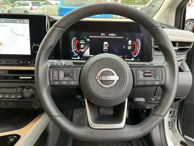 日産 オーラ G レザーエディション 栃木県 2022(令4)年 0.7万km ピュアホワイトパール エマージェンシーブレーキ/純正9インチナビ/フルセグTV/Bluetooth/USB/バックカメラ/ビルトインETC/前後ドライブレコーダー/前席シートヒーター/BOSEパーソナルプラスサウンドシステム/プロパイロット/アラウンドビューモニター/インテリジェントルームミラー/アダプティブクルーズコントロール/プッシュスタート/ステアリングリモコン/LEDオートライト/LEDフォグランプ/社外17インチスタッドレスタイヤ/アイドリングストップ/ハンドルヒーター/ドアバイザー/ワイヤレス充電/電動格納ミラー/ゼログラビティシート