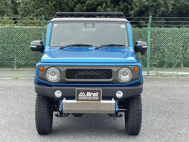 スズキ ジムニー XC 秋田県 2018(平30)年 2.1万km ブリスクブルーメタリック/ブラック2トーンルーフ 【社外パーツあり】/５速ＭＴ車/リフトアップ/減衰調整付きショックアブソーバー/ロッソモデロマフラー　/前後パイプバンパー　/スキッドプレート　/牽引フック/リアラダー/ボンネット油圧ダンパー　/ルーフラック　/黒革調シートカバー　/純正８インチナビ　/バックカメラ　/フルセグTV/ドラレコ　/ＥＴＣ　/前席シートヒーター/クルーズコントロール/スズキセーフティ/LEDヘッドライト/フォグランプ/純正フロアマット