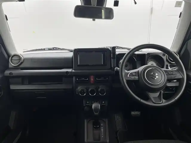 スズキ ジムニー シエラ JC 茨城県 2024(令6)年 0.9万km ミディアムグレー 社外ナビ/フルセグ視聴可/Bluetooth接続/ETC/バックカメラ/ダウンヒルアシストコントロール/クルコン/DVD再生可/シートヒーター（D＋N席）/純正AW
