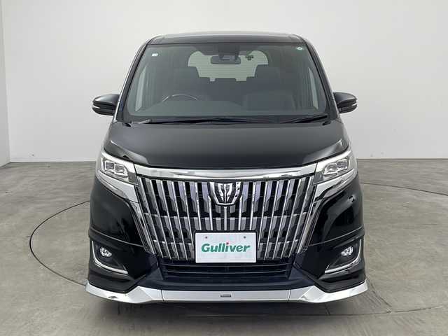 トヨタ エスクァイア Gi 兵庫県 2018(平30)年 8万km ブラック ・ワンオーナー車/・純正9インチナビ/・Bluetooth/フルセグテレビ/DVD/CD/SD/USB/・バックカメラ/・Toyota Safety Sense/・プリクラッシュセーフティ/・レーンディパーチャーアラート/・オートマチックハイビーム/・先行車発進告知機能/・アイドリングストップ/・横滑り防止装置/・S-VSC/・クルーズコントロール/・純正12.1インチリアフリップダウンモニター/・両側パワースライドドア/・レザーシート/・シートヒーター/・シートリフター/・リアオートエアコン/・純正フロアマット/・ステアリングリモコン/・純正15インチアルミホイール/・LEDオートライト/・フォグランプ/・モデリスタエアロ/・ビルドインETC