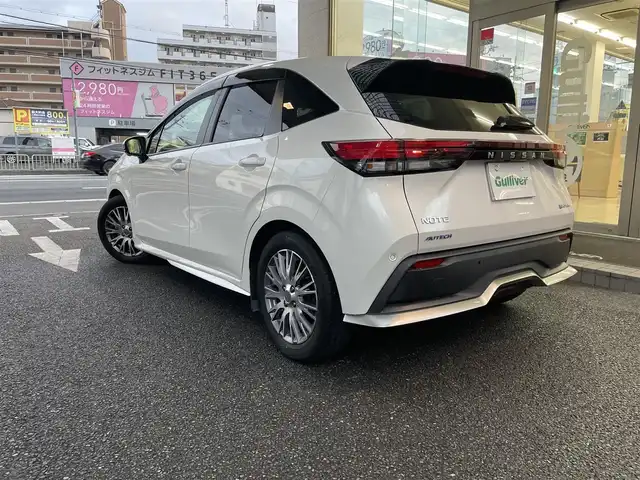 日産 ノート オーテック 大阪府 2021(令3)年 2.3万km ピュアホワイトパール ワンオーナー/純正メモリナビ/フルセグテレビ/BT/AM/FM/USB/HDMI/アラウンドビューモニター/BSM/ACC/シートヒーター/置き型充電/デジタルインナーミラー/ドアバイザー/プッシュスタート/ETC