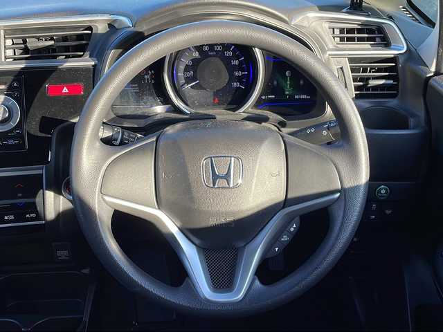 ホンダ フィット ハイブリット Fパッケージ 道東・釧路十勝 2014(平26)年 8.1万km クリスタルブラックパール 4WD/純正オーディオ/・CD/ラジオ/USB/AUX/ワイパーデアイザー/LEDヘッドライト/ミラーヒーター/ETC/フロアマット/ドアバイザー