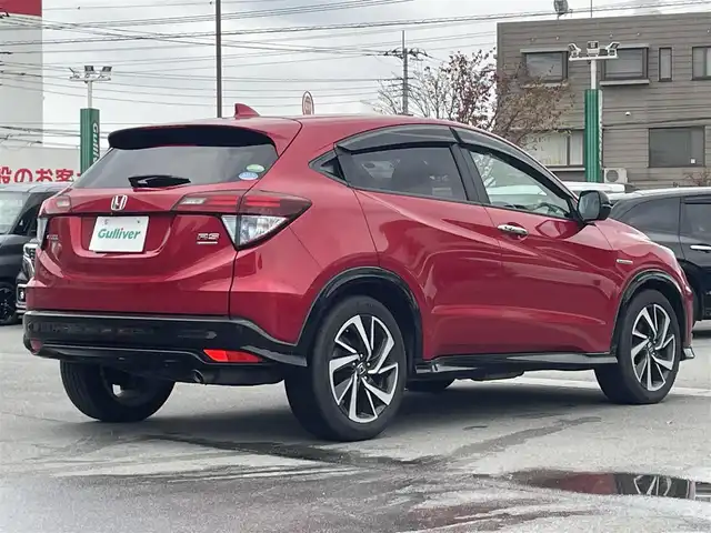 ホンダ ヴェゼル ハイブリッド RS ホンダセンシング 静岡県 2017(平29)年 7.1万km プレミアムクリスタルレッドM 純正SDナビ（ワンセグTV、バックカメラ、DVS再生機能、CDチェンジャー、BT）/ホンダセンシング/バックカメラ/クルーズコントロール/パドルシフト/D＋N席シートヒーター/合皮シート/純正フロアマット/純正アルミホイール/オートエアコン/ABS/オートライト/レーンキープアシスト/横滑り防止装置/衝突軽減システム/パワーウィンドウ/パワーステアリング