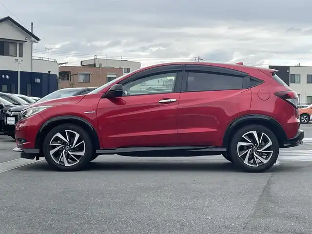 ホンダ ヴェゼル ハイブリッド RS ホンダセンシング 静岡県 2017(平29)年 7.1万km プレミアムクリスタルレッドM 純正SDナビ（ワンセグTV、バックカメラ、DVS再生機能、CDチェンジャー、BT）/ホンダセンシング/バックカメラ/クルーズコントロール/パドルシフト/D＋N席シートヒーター/合皮シート/純正フロアマット/純正アルミホイール/オートエアコン/ABS/オートライト/レーンキープアシスト/横滑り防止装置/衝突軽減システム/パワーウィンドウ/パワーステアリング