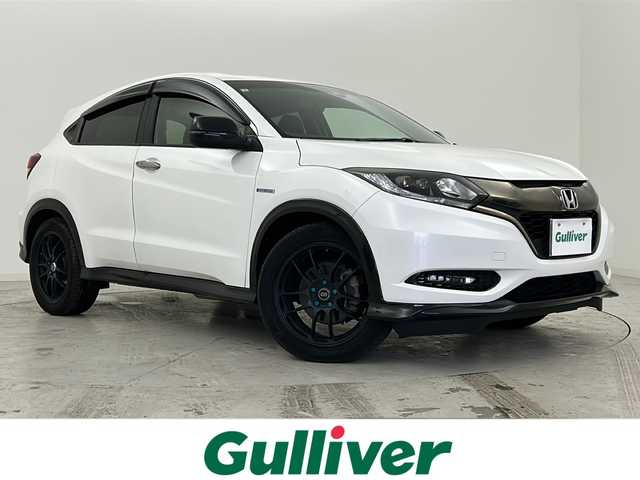 ホンダ ヴェゼル ハイブリッド RS ホンダセンシング 宮城県 2017(平29)年 7.5万km ホワイトオーキッドパール 禁煙車/MOMOシフトレバー/Honda SENSING/・衝突軽減ブレーキ/・路外逸脱抑制機能/・先行車発進お知らせ機能				/・アダプティブクルーズコントロール	/・車線維持支援システム/純正ナビ/・BT.CD.DVD.SD.USB.HDMI/フルセグTV/バックカメラ/ビルトインETC/革巻ステアリング/ステアリングスイッチ/パドルシフト/プッシュスタート/スマートキー×2/ハーフレザーシート/シートヒーター(D.N)/純正フロアマッド/電子パーキングブレーキ/LEDヘッドライト/LEDフォグランプ/アイドリングストップ/横滑り防止機能