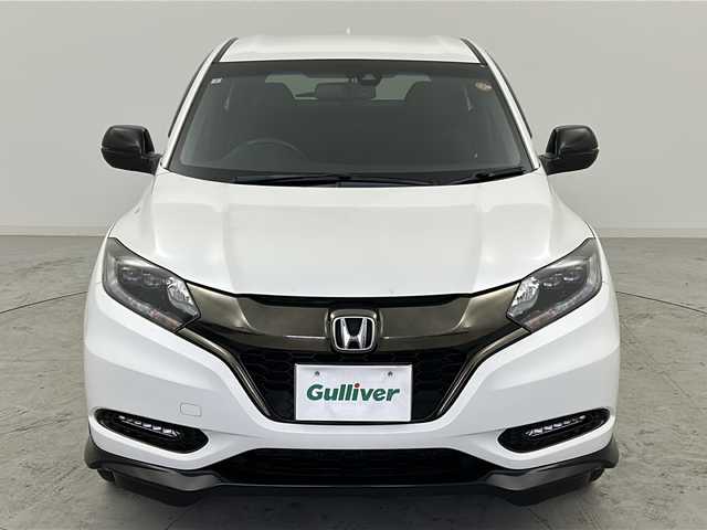 ホンダ ヴェゼル ハイブリッド RS ホンダセンシング 宮城県 2017(平29)年 7.5万km ホワイトオーキッドパール 禁煙車/MOMOシフトレバー/Honda SENSING/・衝突軽減ブレーキ/・路外逸脱抑制機能/・先行車発進お知らせ機能				/・アダプティブクルーズコントロール	/・車線維持支援システム/純正ナビ/・BT.CD.DVD.SD.USB.HDMI/フルセグTV/バックカメラ/ビルトインETC/革巻ステアリング/ステアリングスイッチ/パドルシフト/プッシュスタート/スマートキー×2/ハーフレザーシート/シートヒーター(D.N)/純正フロアマッド/電子パーキングブレーキ/LEDヘッドライト/LEDフォグランプ/アイドリングストップ/横滑り防止機能