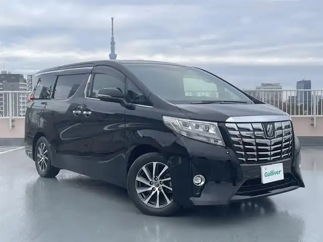 トヨタ アルファード エグゼクティブ ラウンジ 東京都 2017(平29)年 2.3万km ブラック 純正SDナビ/純正フリップダウンモニター/黒皮シート/サンルーフ/バックカメラ/シートヒーター/エアシート/ステアリングヒーター/両側パワースライドドア/JBLサラウンドシステム/純正１７インチアルミ/ビルトインETC/タッチパネル式ミラー型ドライブレコーダー/（CAR-098)/ビルトインETC/エンジンプッシュボタン/PCS（プリクラッシュセーフティー）/クリアランスソナー/スマートストップ/バイザー・マット/スペアキー１本/保証書・取説・ナビ説