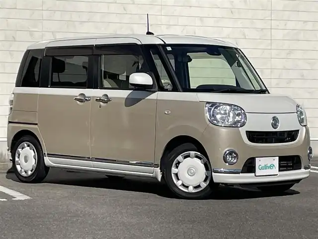 ダイハツ ムーヴ キャンバス X メイクアップ SA Ⅱ 宮崎県 2016(平28)年 4.2万km パールホワイトⅢ/ナチュラルベージュマイカメタリック 2トーン 純正ナビ/（DVD、CD再生機能付き）/アイドリングストップ/パワースタアリング/パワーウィンドウ/エアバックW/プッシュスタート/ドライブレコーダー/純正フロアマット/純正LEDヘッドライト/純正アルミホイール/オートライト機能/横滑り防止装置/衝突被害軽減システム/盗難防止装置/スマートキー/両側スライドドア/電格ミラー/ABS/AAC