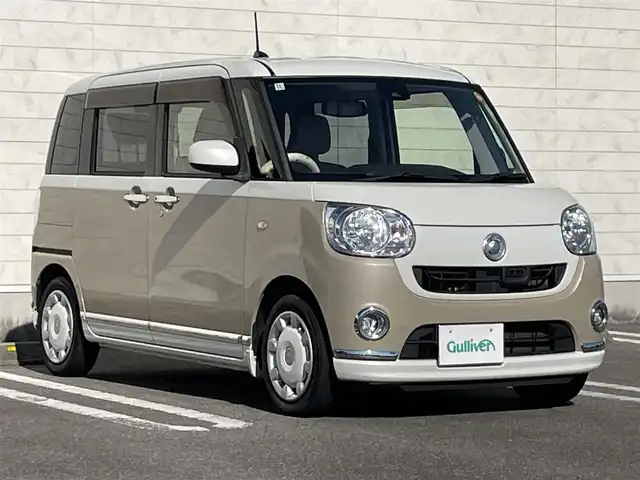 ダイハツ ムーヴ キャンバス X メイクアップ SA Ⅱ 宮崎県 2016(平28)年 4.2万km パールホワイトⅢ/ナチュラルベージュマイカメタリック 2トーン 純正ナビ/（DVD、CD再生機能付き）/アイドリングストップ/パワースタアリング/パワーウィンドウ/エアバックW/プッシュスタート/ドライブレコーダー/純正フロアマット/純正LEDヘッドライト/純正アルミホイール/オートライト機能/横滑り防止装置/衝突被害軽減システム/盗難防止装置/スマートキー/両側スライドドア/電格ミラー/ABS/AAC