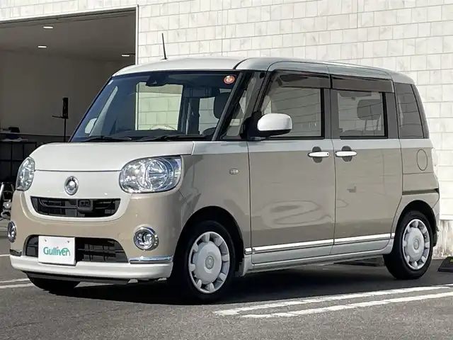 ダイハツ ムーヴ キャンバス X メイクアップ SA Ⅱ 宮崎県 2016(平28)年 4.2万km パールホワイトⅢ/ナチュラルベージュマイカメタリック 2トーン 純正ナビ/（DVD、CD再生機能付き）/アイドリングストップ/パワースタアリング/パワーウィンドウ/エアバックW/プッシュスタート/ドライブレコーダー/純正フロアマット/純正LEDヘッドライト/純正アルミホイール/オートライト機能/横滑り防止装置/衝突被害軽減システム/盗難防止装置/スマートキー/両側スライドドア/電格ミラー/ABS/AAC